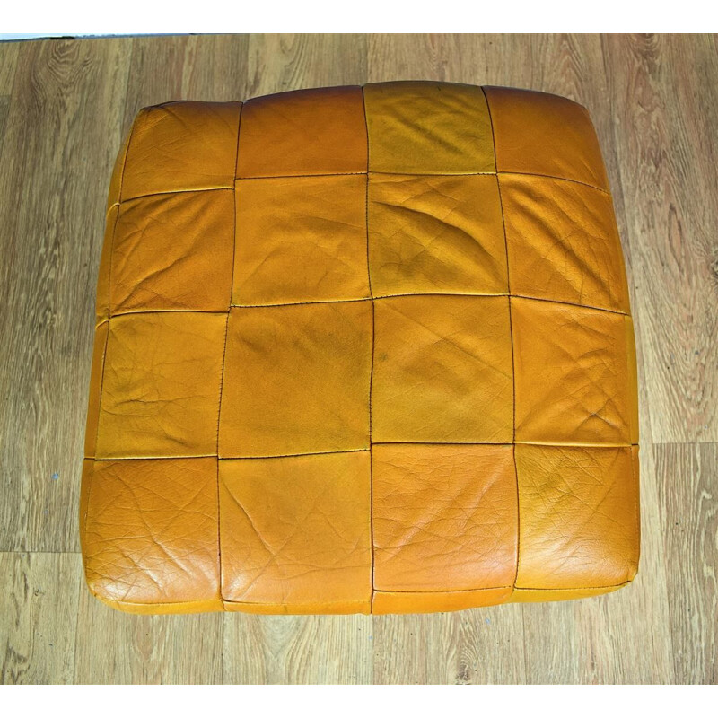 Vintage Danish swivel ottoman in tan leather