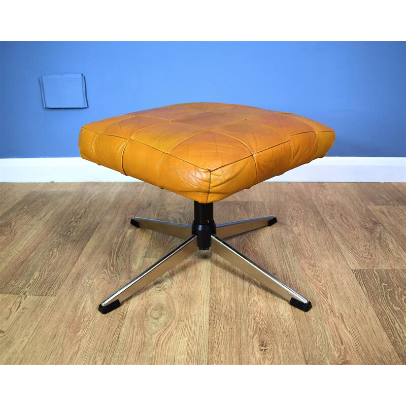 Vintage Danish swivel ottoman in tan leather