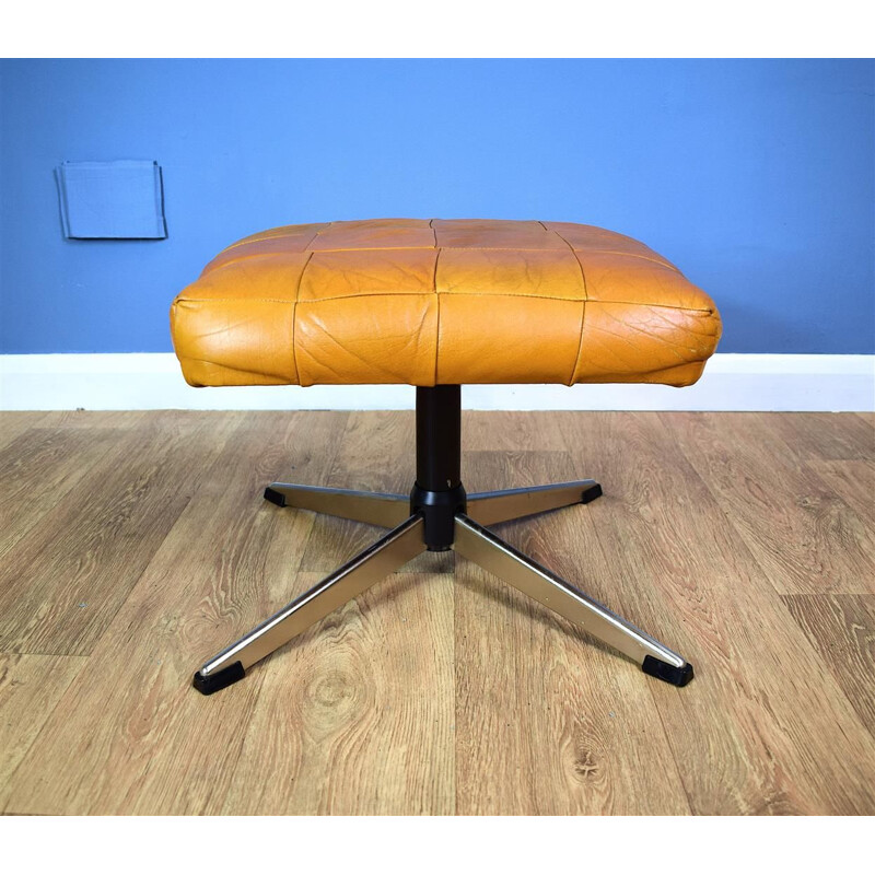 Vintage Danish swivel ottoman in tan leather