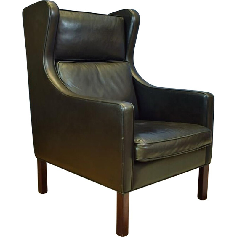 Vintage Danish wingback armchair in black leather