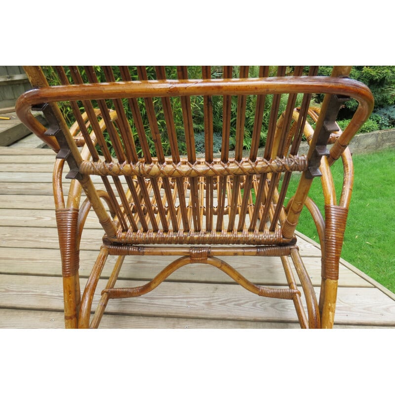Vintage chaise lounge with footstool in cane and rattan