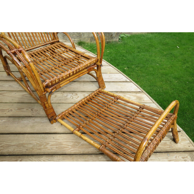 Vintage chaise lounge with footstool in cane and rattan