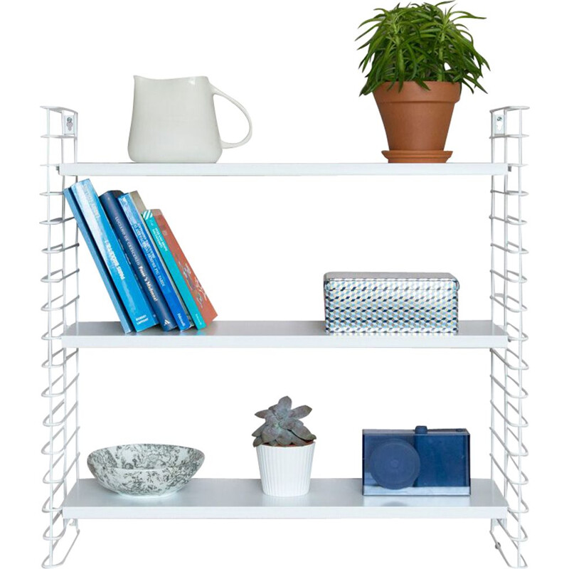 White "Tomado" shelves by Adrian Dekker 