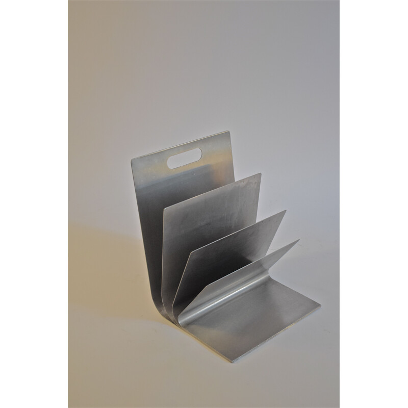 Magazine rack by Xavier Feal in brushed steel