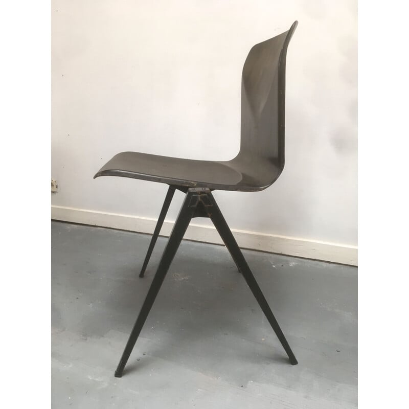 Vintage industrial stacking chair by Wim Rietveld and Friso Kramer