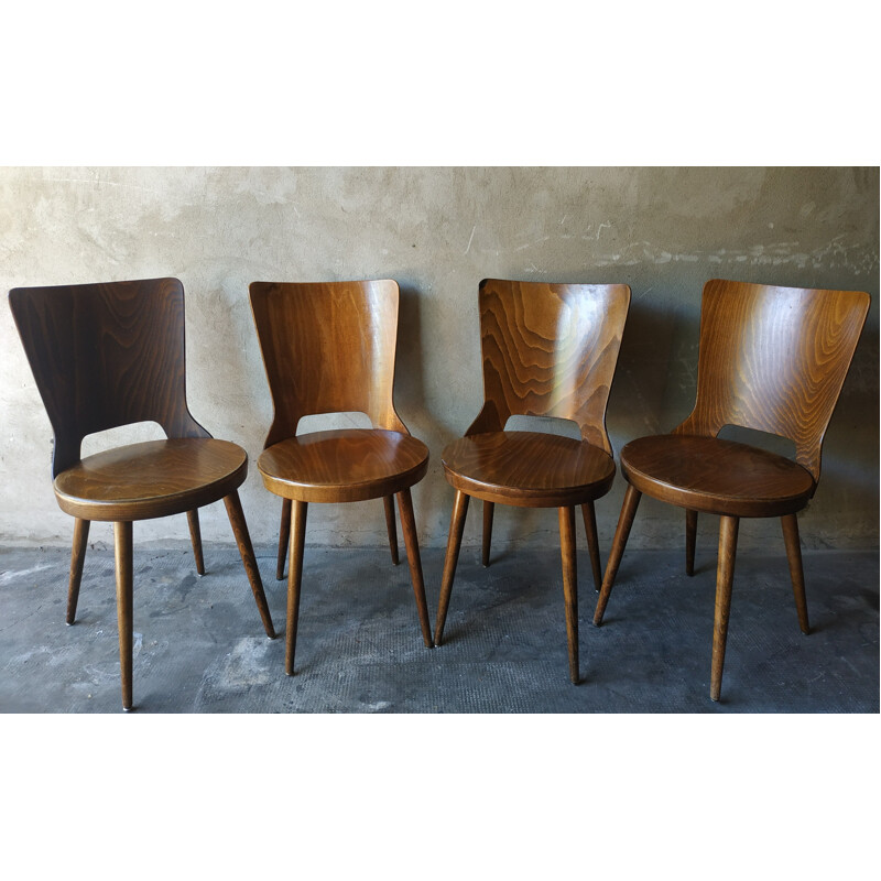 Suite de 4 chaises de bistrot "Mondor" par Baumann