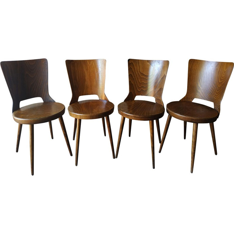 Suite de 4 chaises de bistrot "Mondor" par Baumann