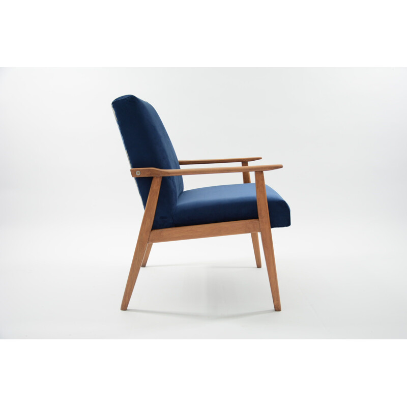 Vintage blue jungle wooden armchair