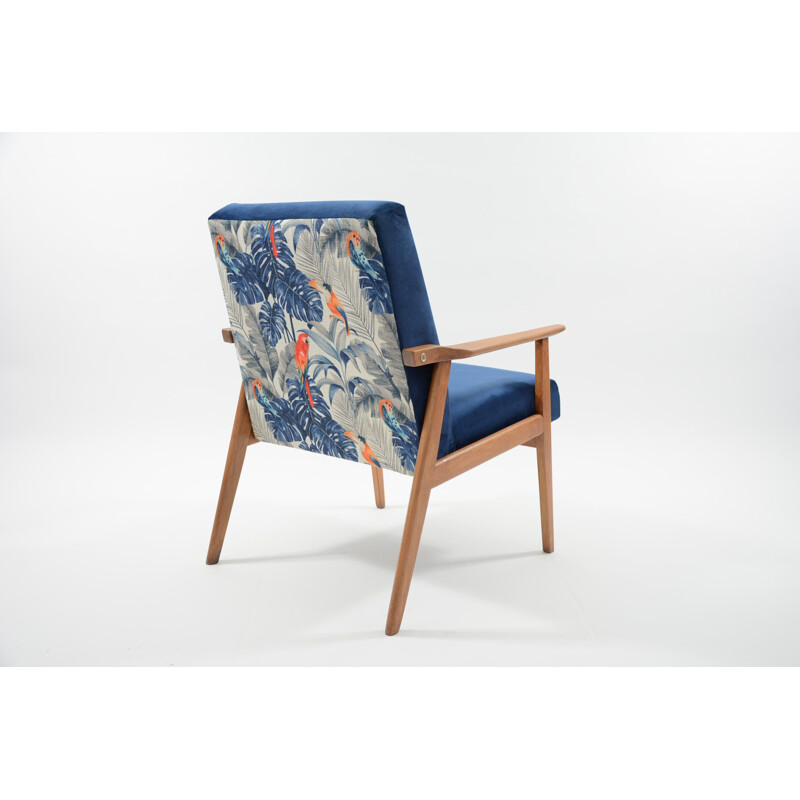 Vintage blue jungle wooden armchair