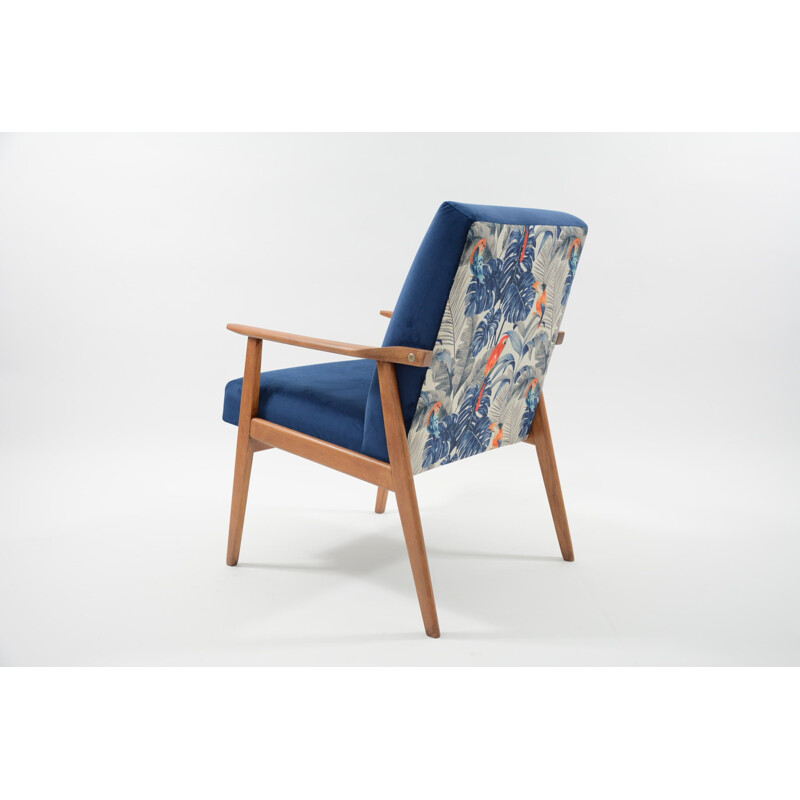 Vintage blue jungle wooden armchair