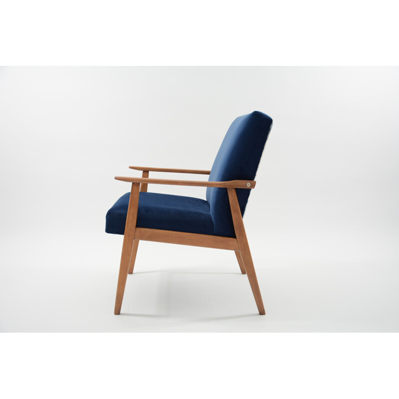 Vintage blue jungle wooden armchair