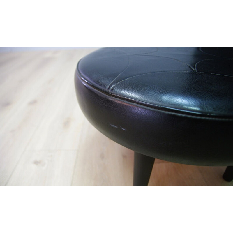 Vintage Danish footrest in black leather