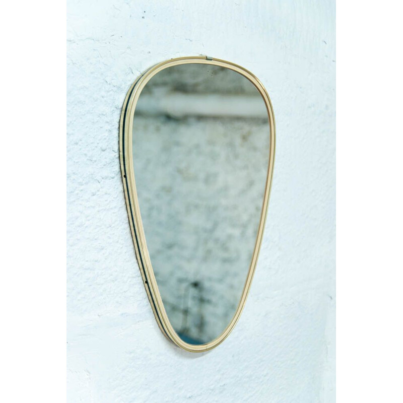 Miroir ovale vintage en laiton doré