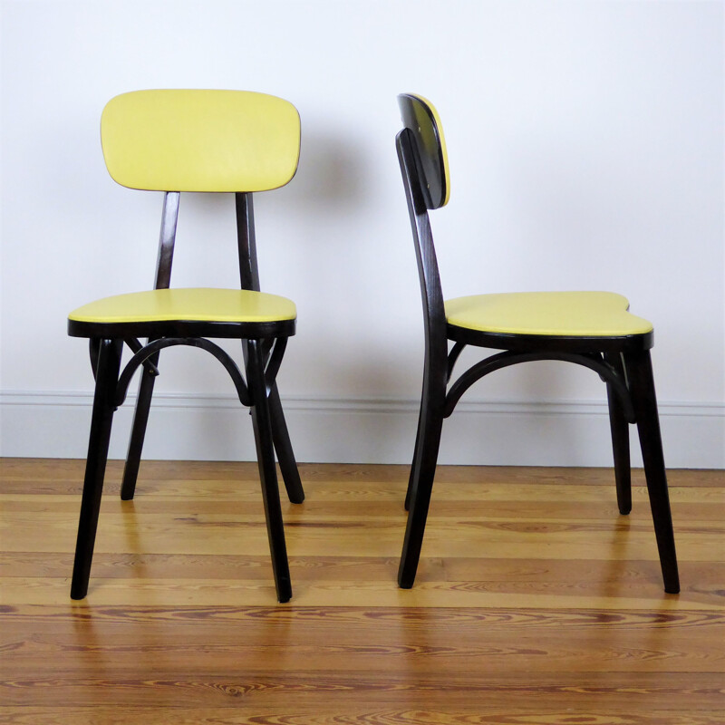 Pair of Vintage yellow Baumann chairs 1960