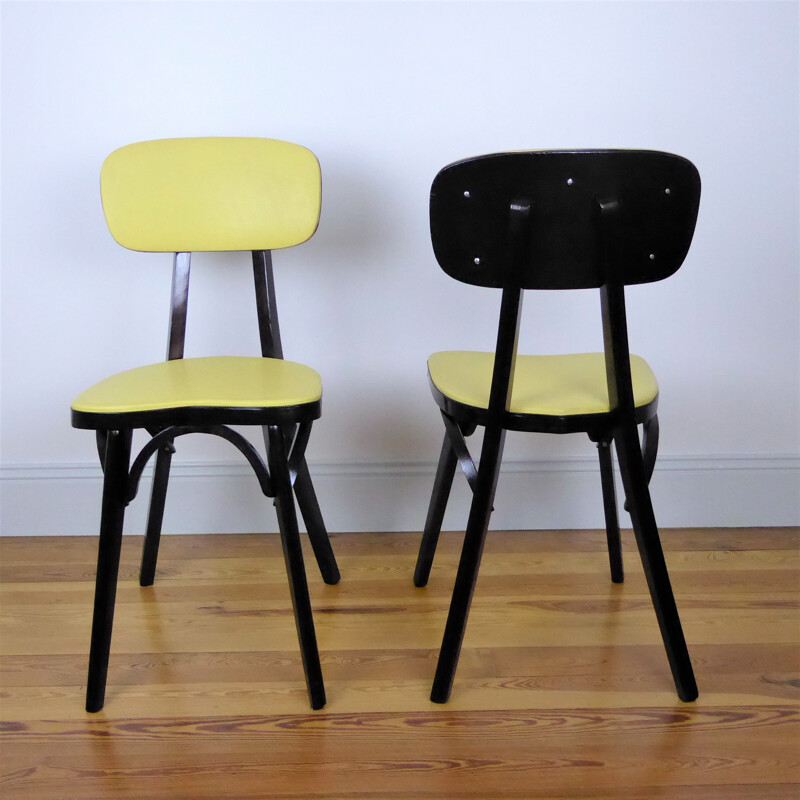 Pair of Vintage yellow Baumann chairs 1960