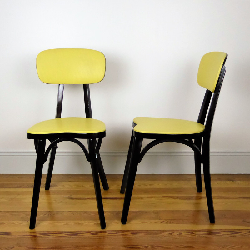 Pair of Vintage yellow Baumann chairs 1960