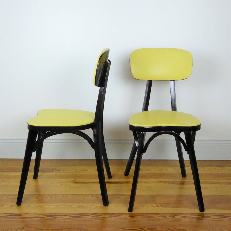 Pair of Vintage yellow Baumann chairs 1960