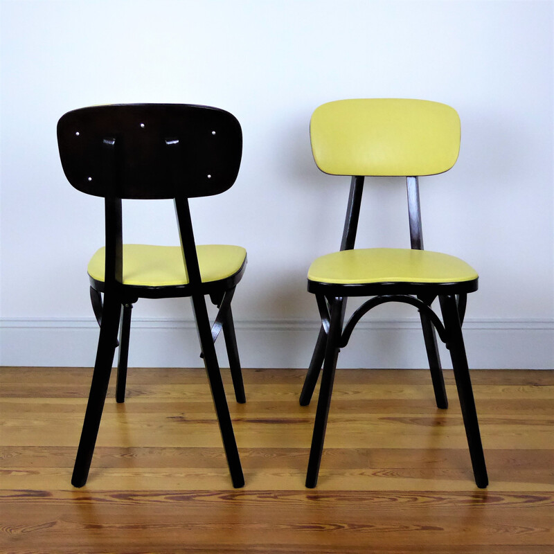 Pair of Vintage yellow Baumann chairs 1960
