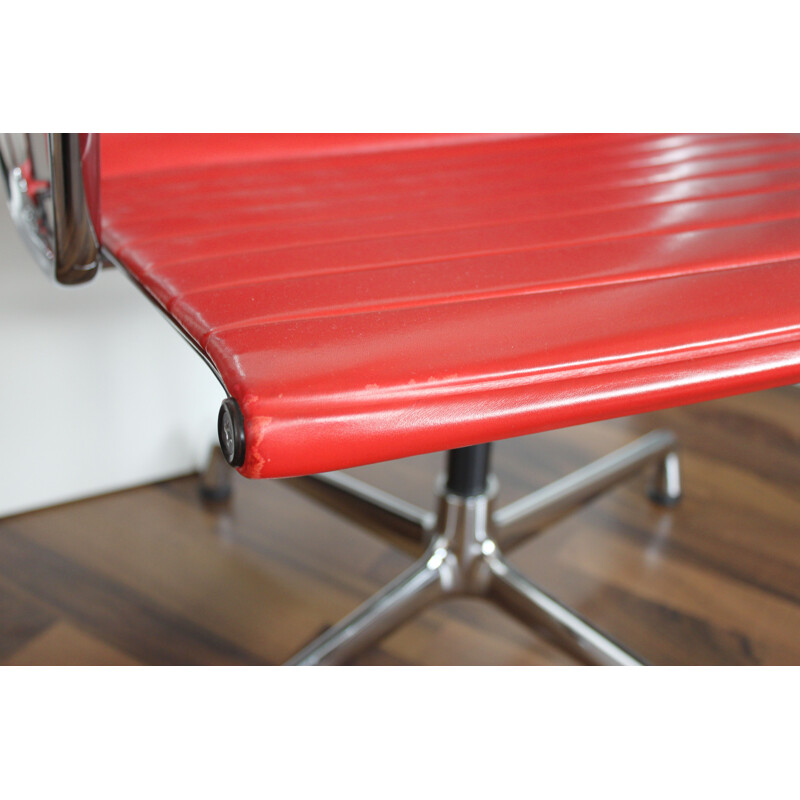 Vintage office chair EA 108 in red leather by Eames for Vitra