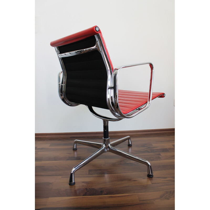 Vintage office chair EA 108 in red leather by Eames for Vitra