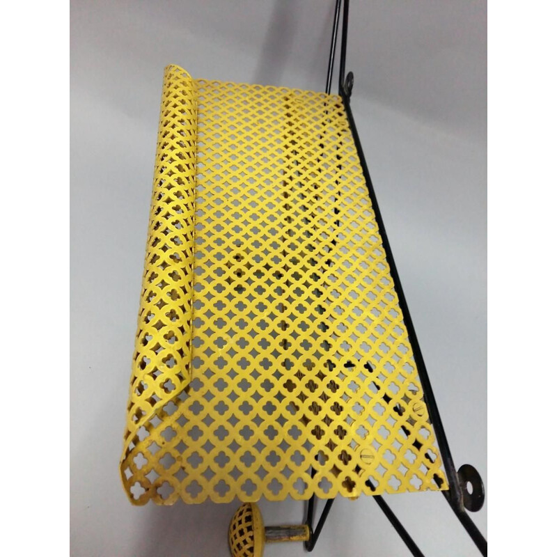 Vintage wall coat rack in perforated metal