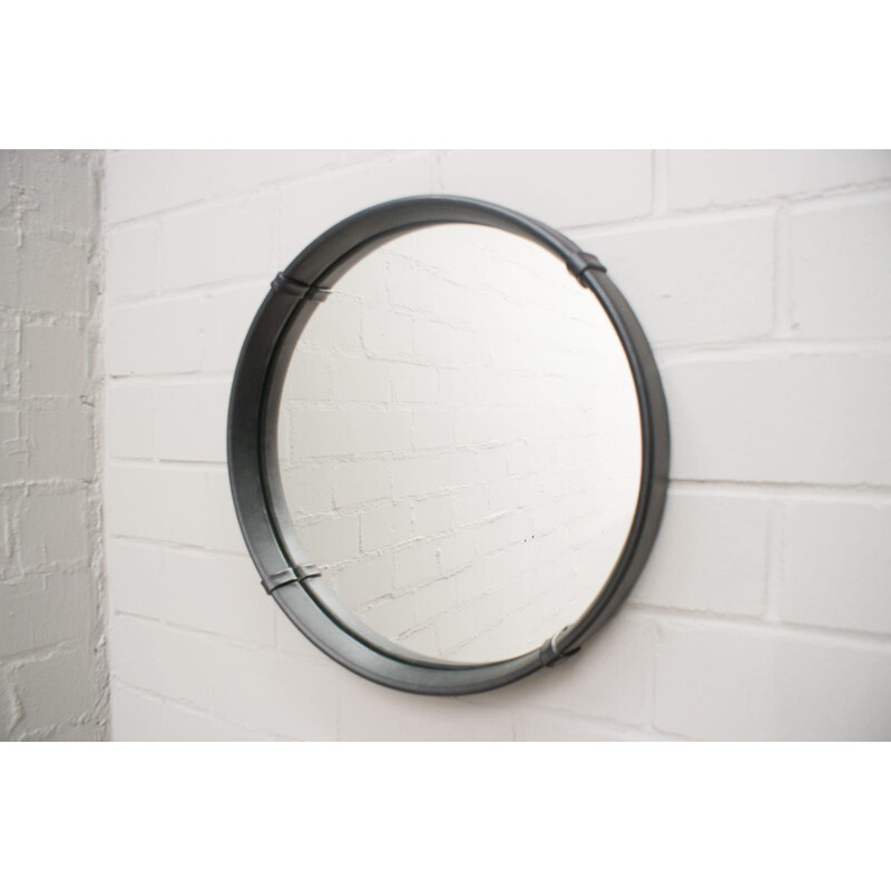 Vintage round wall mirror in leather