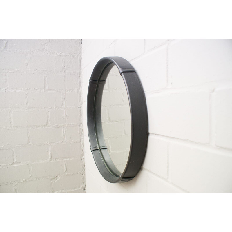 Vintage round wall mirror in leather