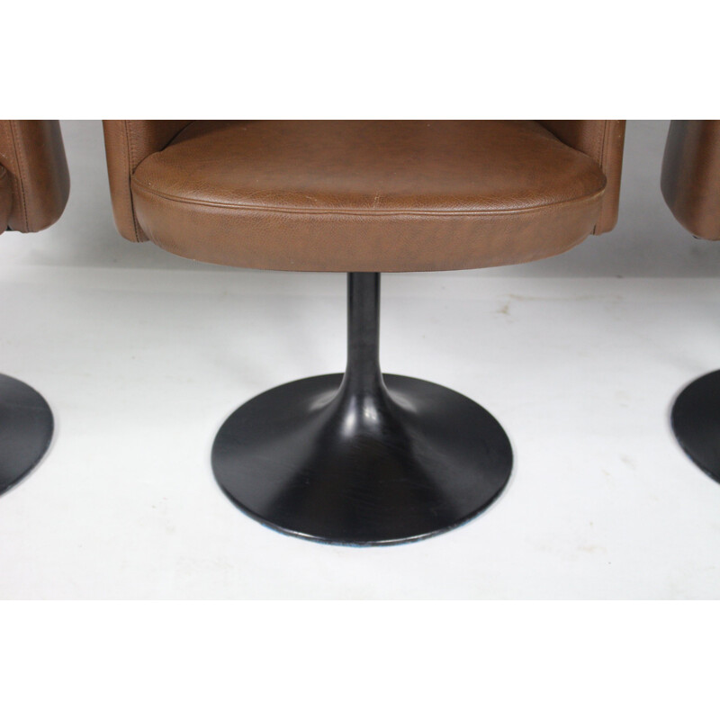 Set of 4 vintage swivel chairs in leather by Cassina