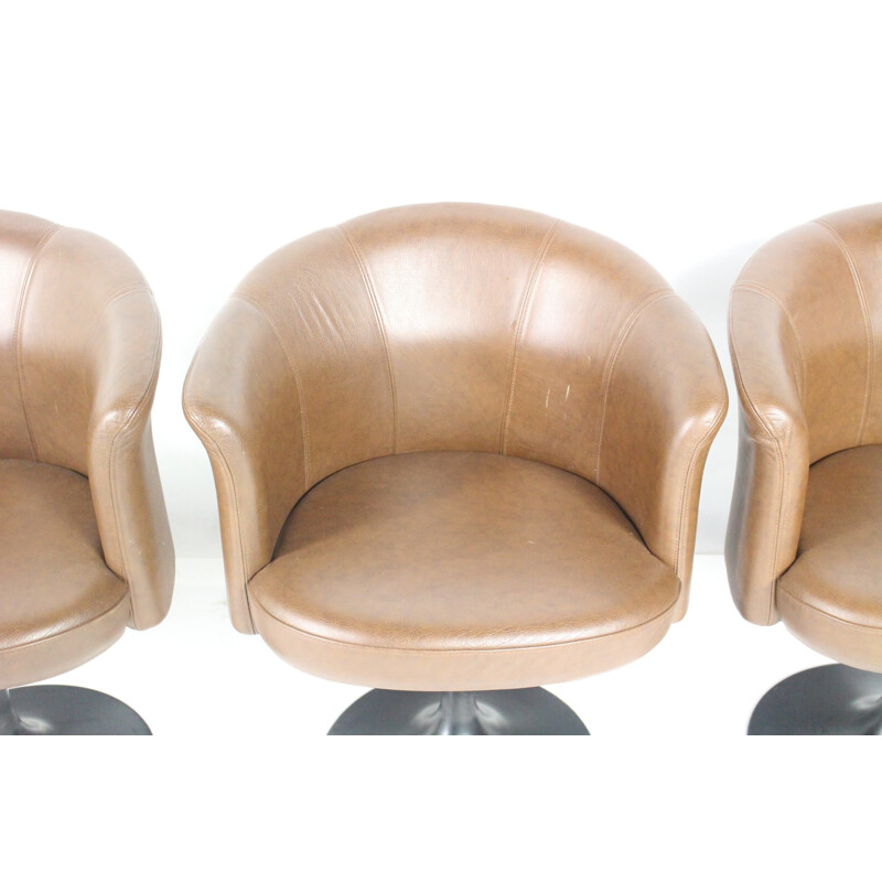 Suite de 4 chaises pivotantes vintage en cuir par Cassina