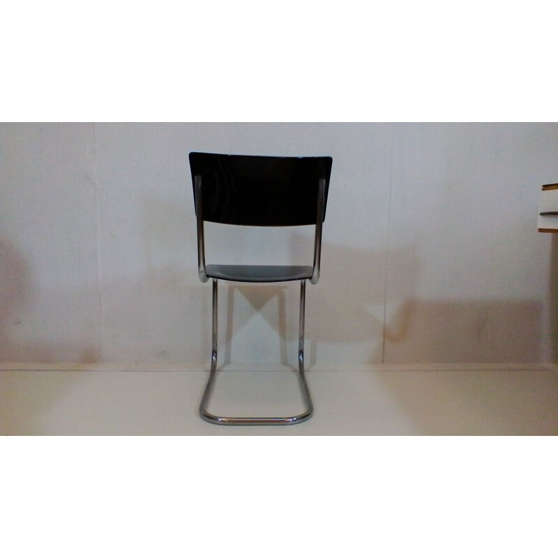 Vintage zwarte en chromen stoel van Jindrich Halabala