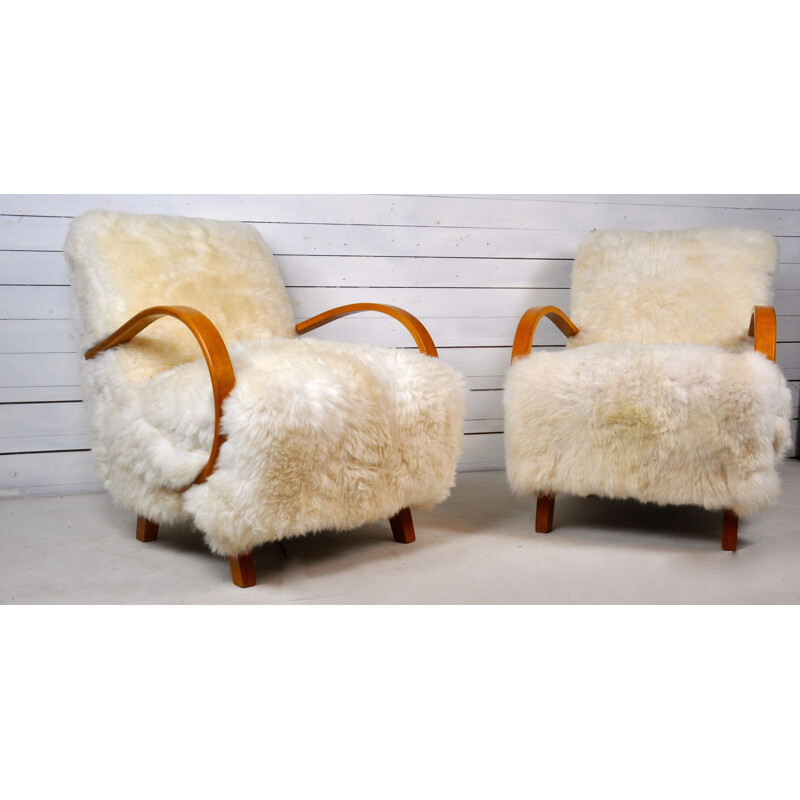 Set of 2 vintage armchairs in sheepskin by Jindrich Halabala