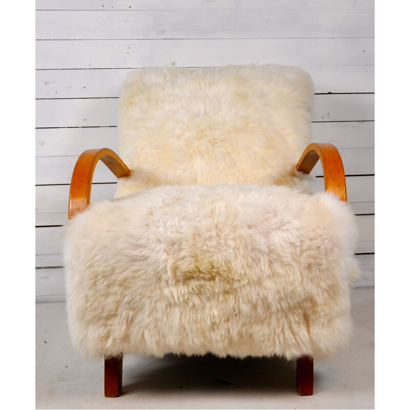 Set of 2 vintage armchairs in sheepskin by Jindrich Halabala