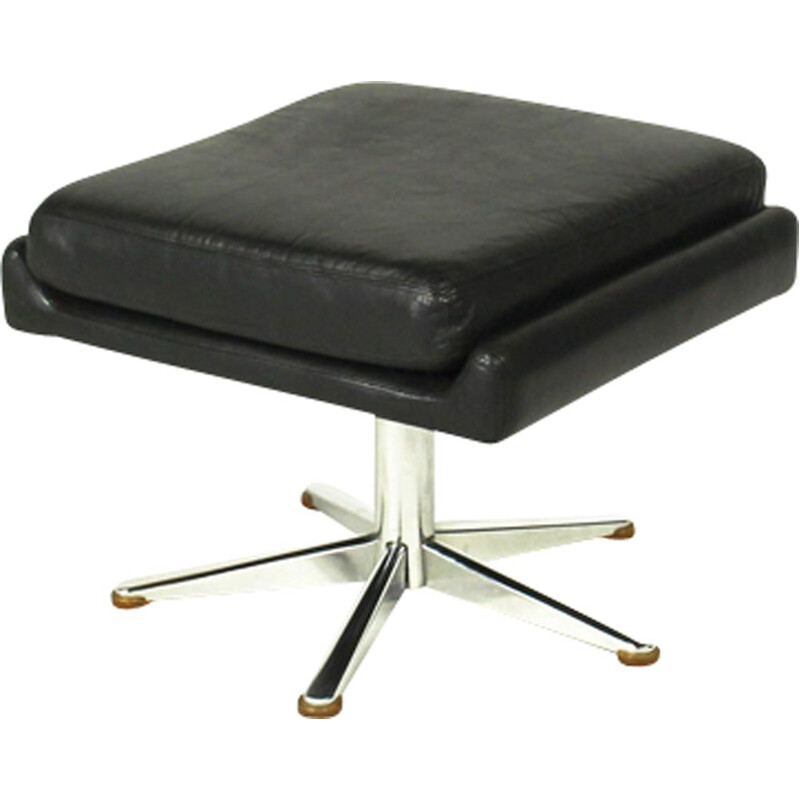 Vintage ottoman in black leather