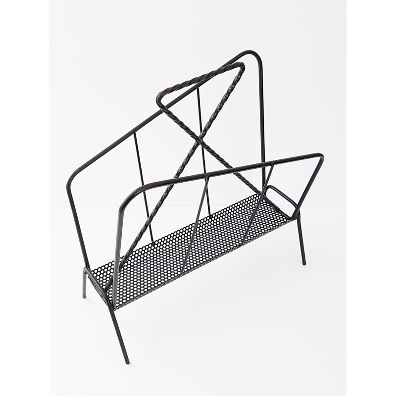 Vintage perforated magazine rack in metal