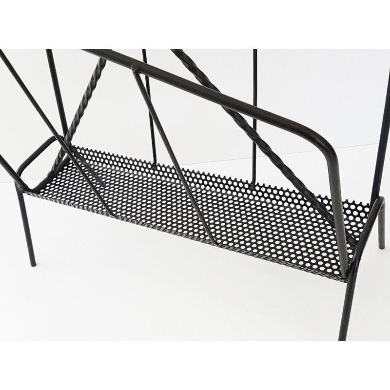 Vintage perforated magazine rack in metal