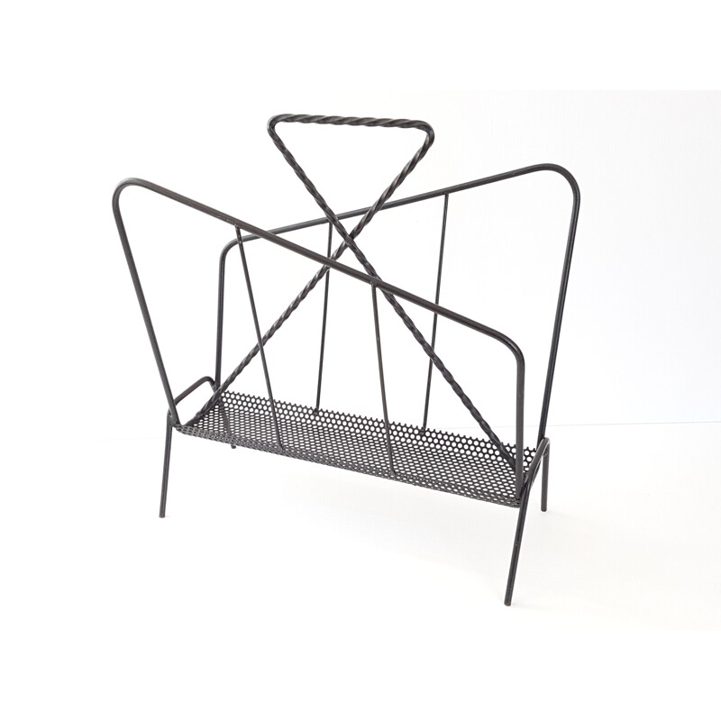 Vintage perforated magazine rack in metal