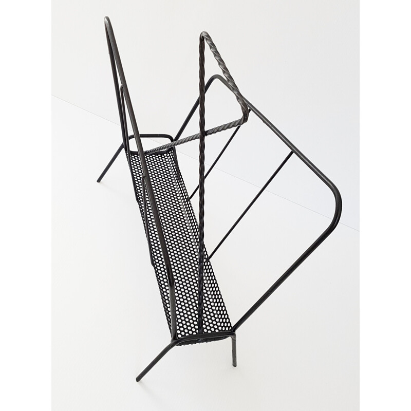 Vintage perforated magazine rack in metal