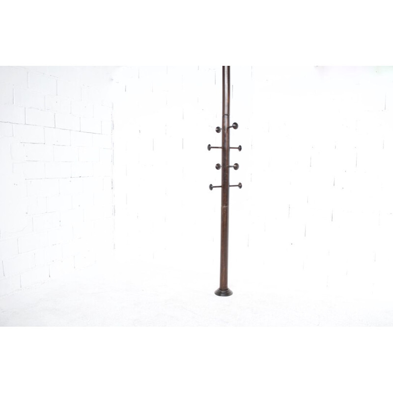 Vintage coat rack floor-to-ceiling