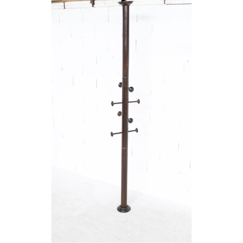 Vintage coat rack floor-to-ceiling