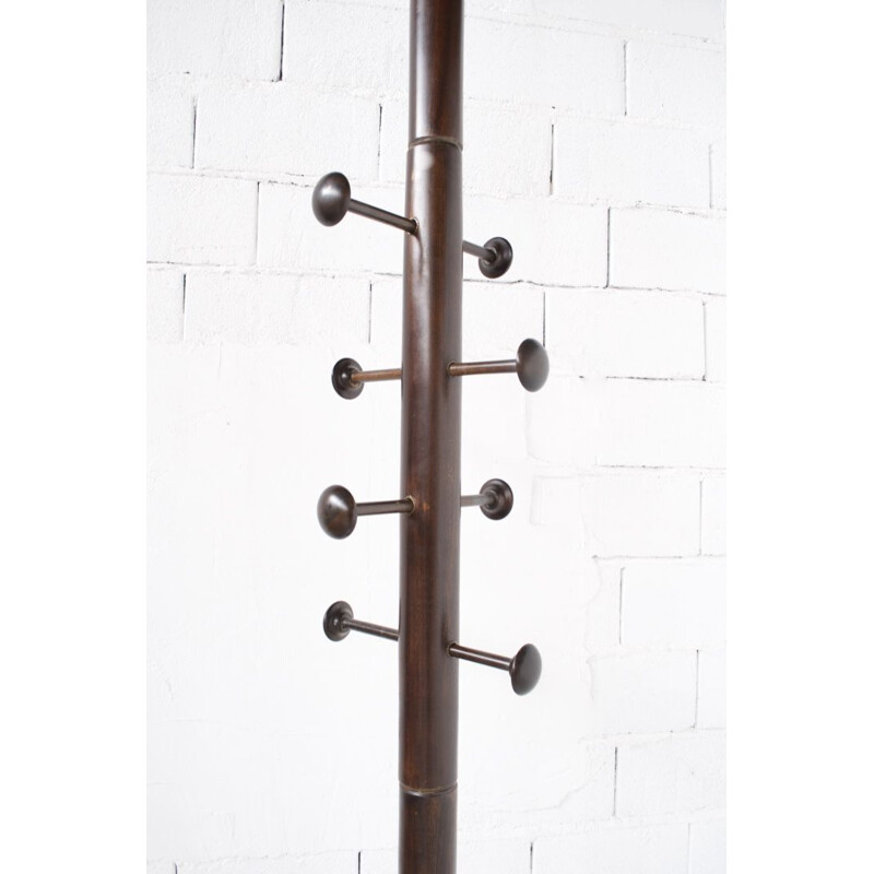 Vintage coat rack floor-to-ceiling