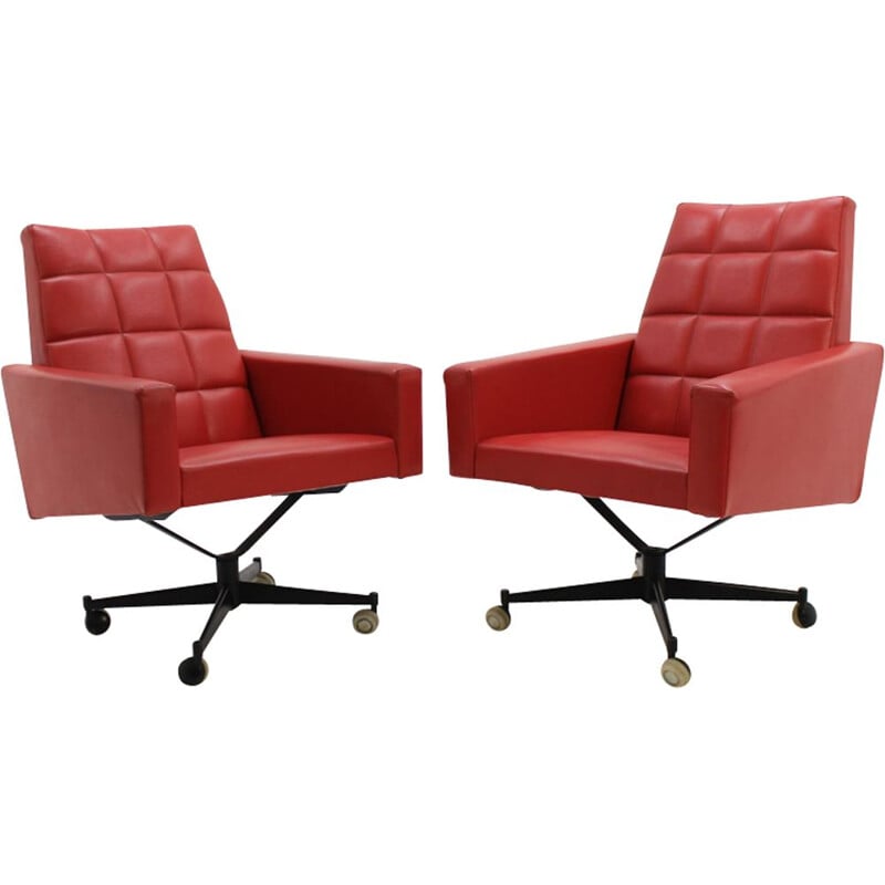 Suite de 2 fauteuils pivotant vintage de simili cuir