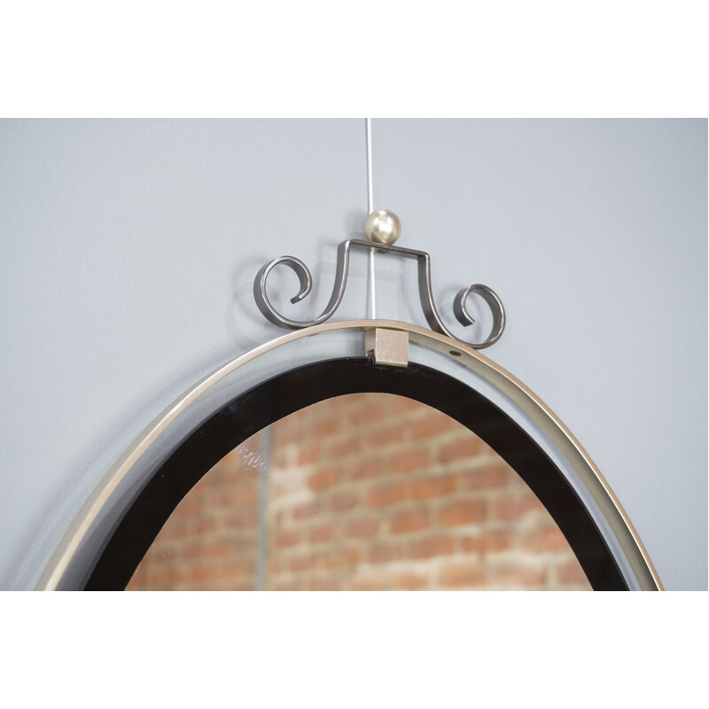 Vintage oval hanging mirror in chrome