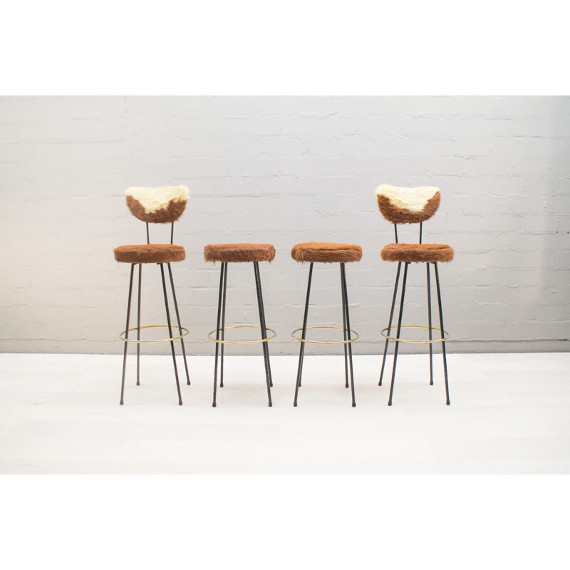 Set of 4 vintage bar stools in longhair cowhide