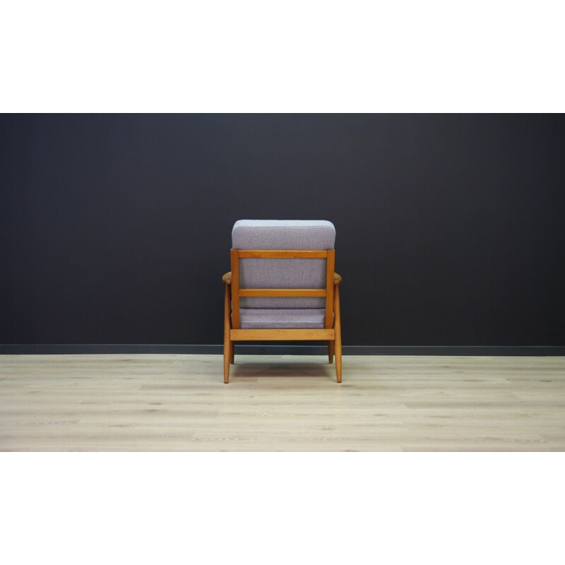 Vintage grey armchair in teak