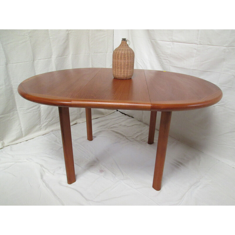 Vintage round dining table in teak