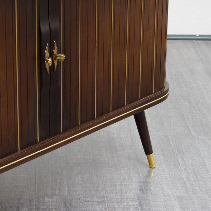 Vintage corner chest of drawers in dark brown wood 1950