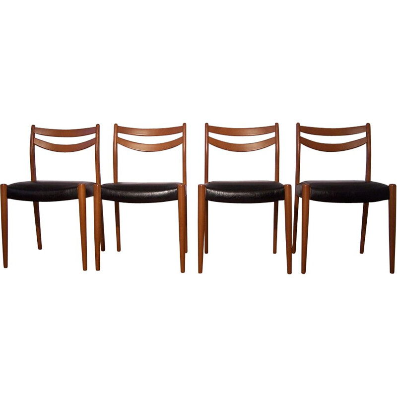 Set of 4 chairs in wood and faux black leather 1960