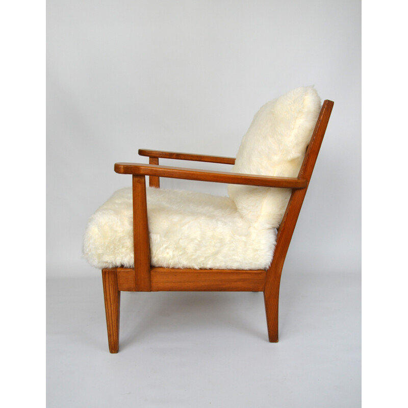 Utö-Lovö armchair in pine wood and sheep, Axel Einar HJORTH - 1940s