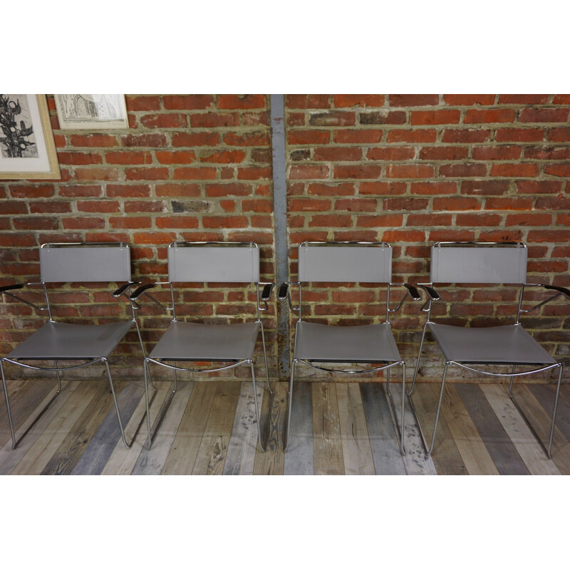 Suite de 4 chaises vintage design chrome et cuir 1970