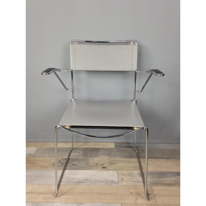 Suite de 4 chaises vintage design chrome et cuir 1970